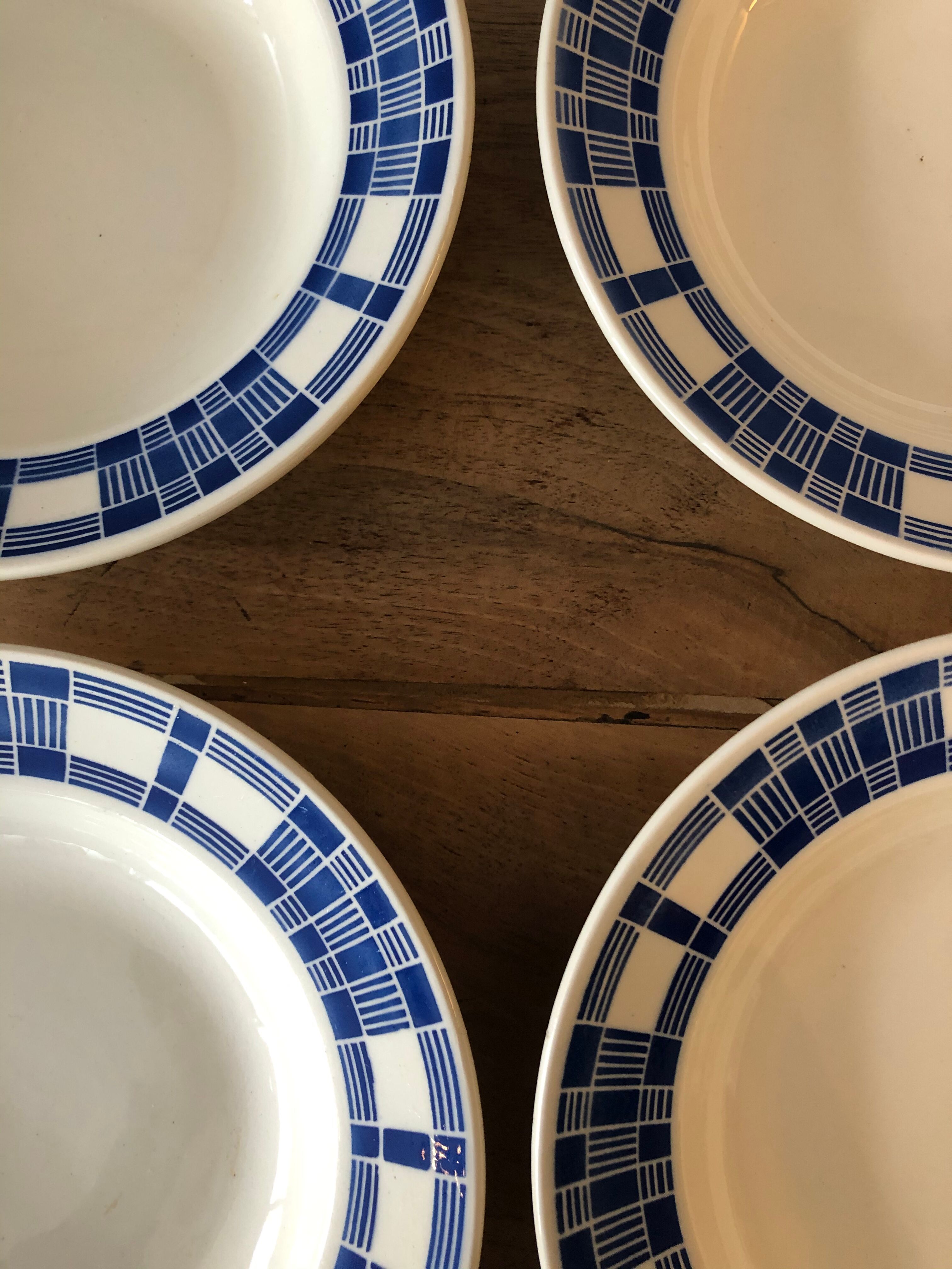 4 hollow plates made of ancient earthenware