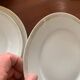 Lot of six flat plates, crockery, old white, gilded
