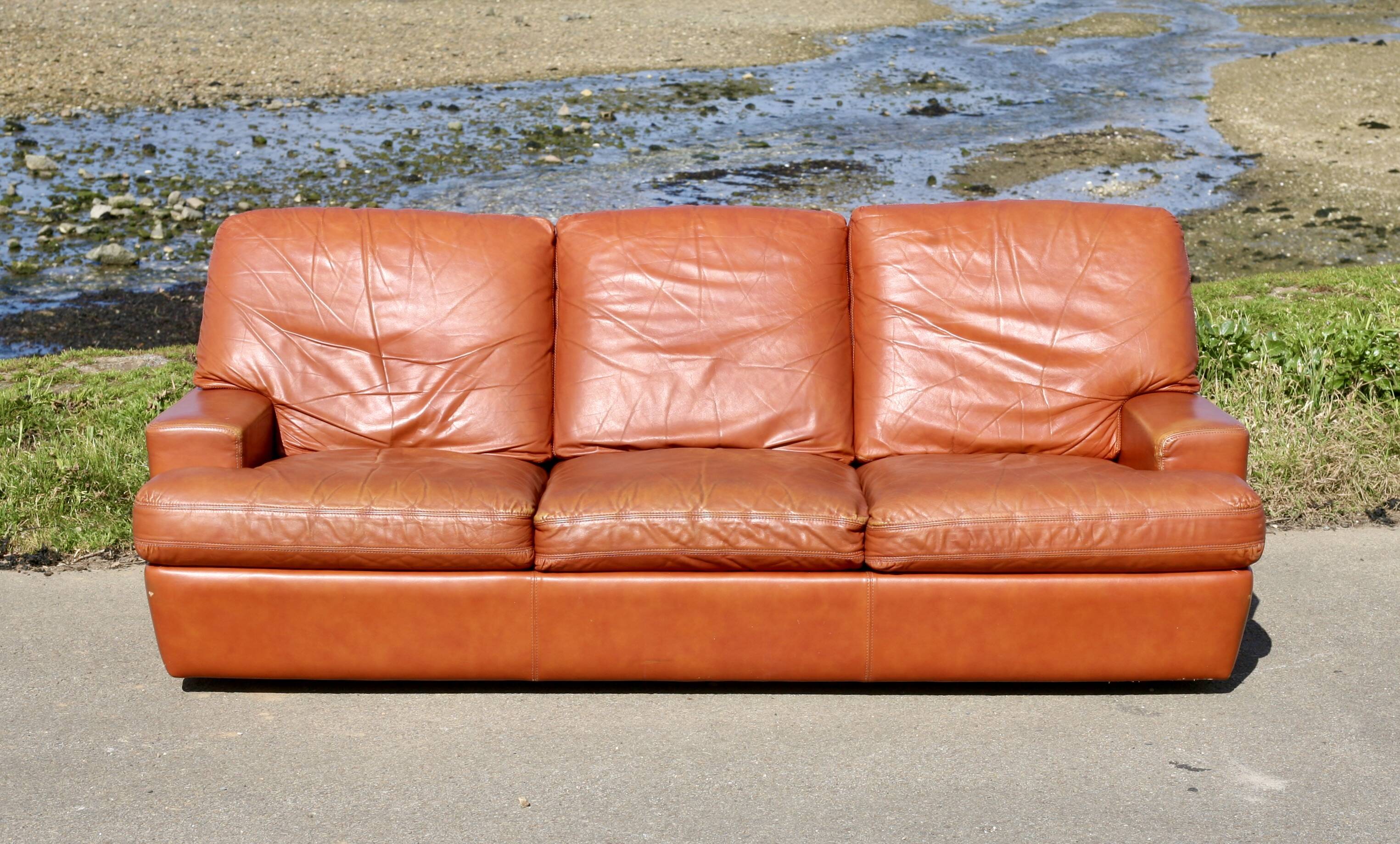 Space age sofa. Tan leather. Circa 1970