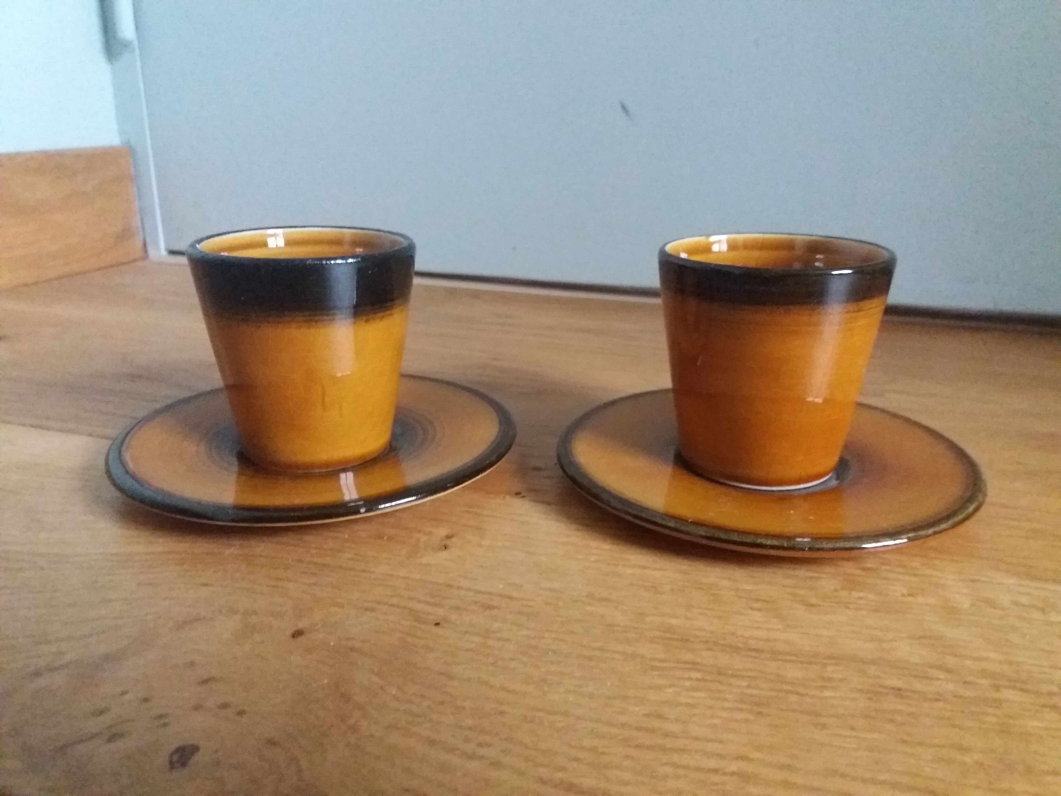 2 Longchamp ceramic coffee cups and saucers