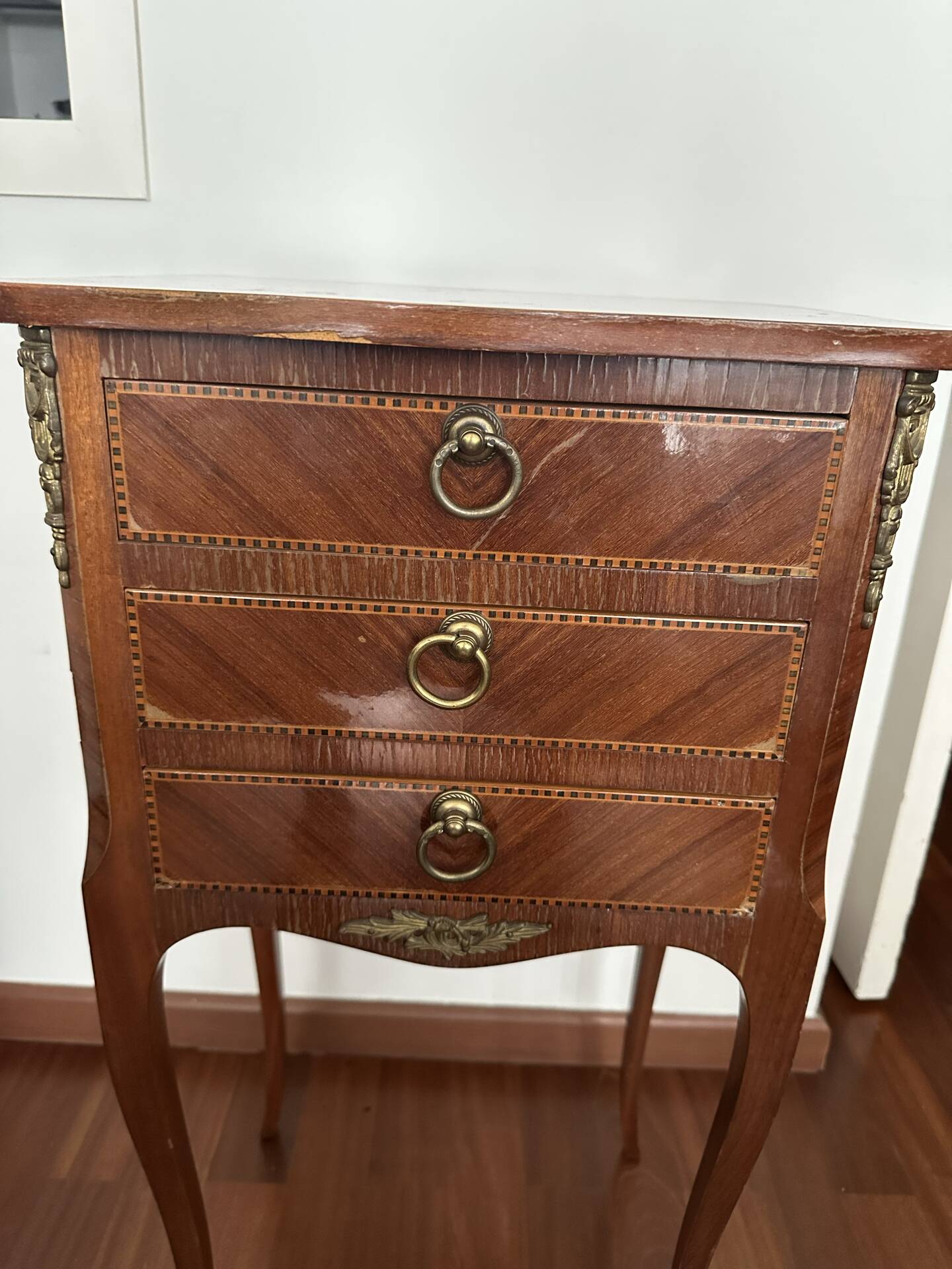 Small bedside table in marquetry in the Louis XV style.