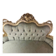 A soft light blue and silver tufted beech wood sofa in Louis style.