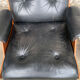 Lounge chair and ottoman black leather and teak multiplex, 1960