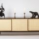 Sideboard in wenge, raffia and lacquered metal. 1970s.