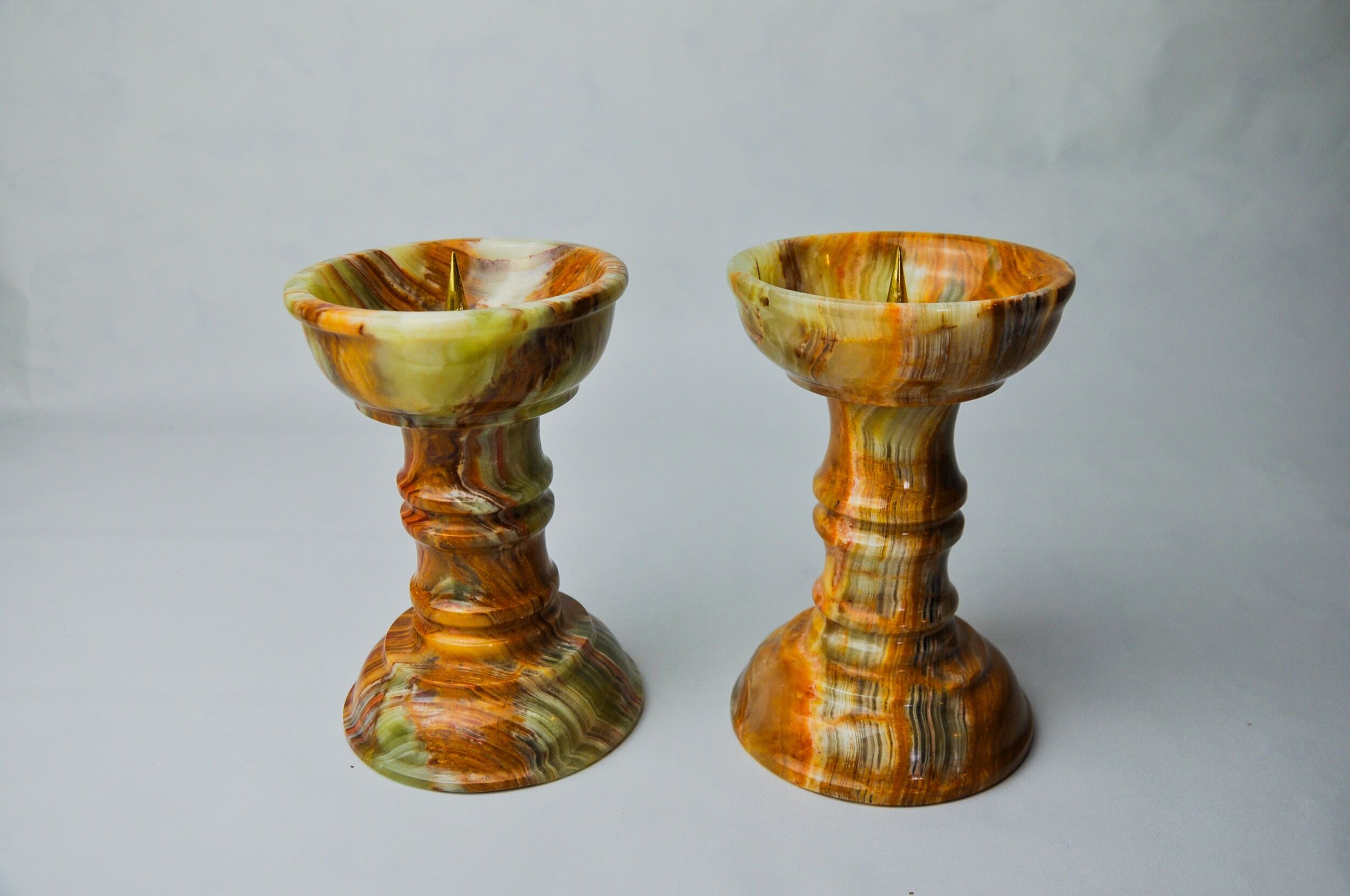 Pair of onyx and brass candle holders, Italy, 1980