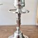 Pair of silver-plated metal candlesticks with 2 branches.