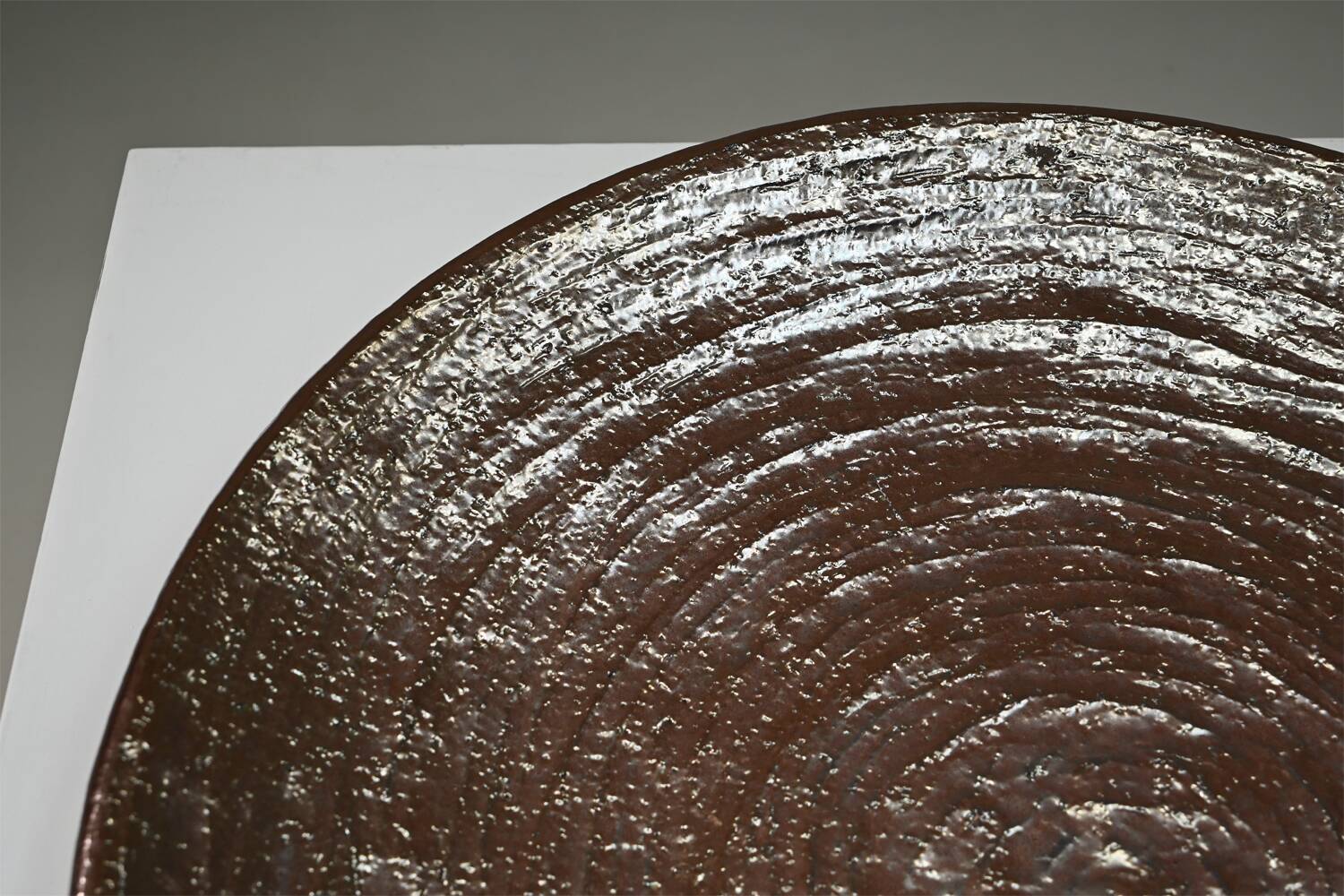 Large handmade metallic glazed ceramic bowl, circa 1980s–1990s.