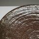 Large handmade metallic glazed ceramic bowl, circa 1980s–1990s.