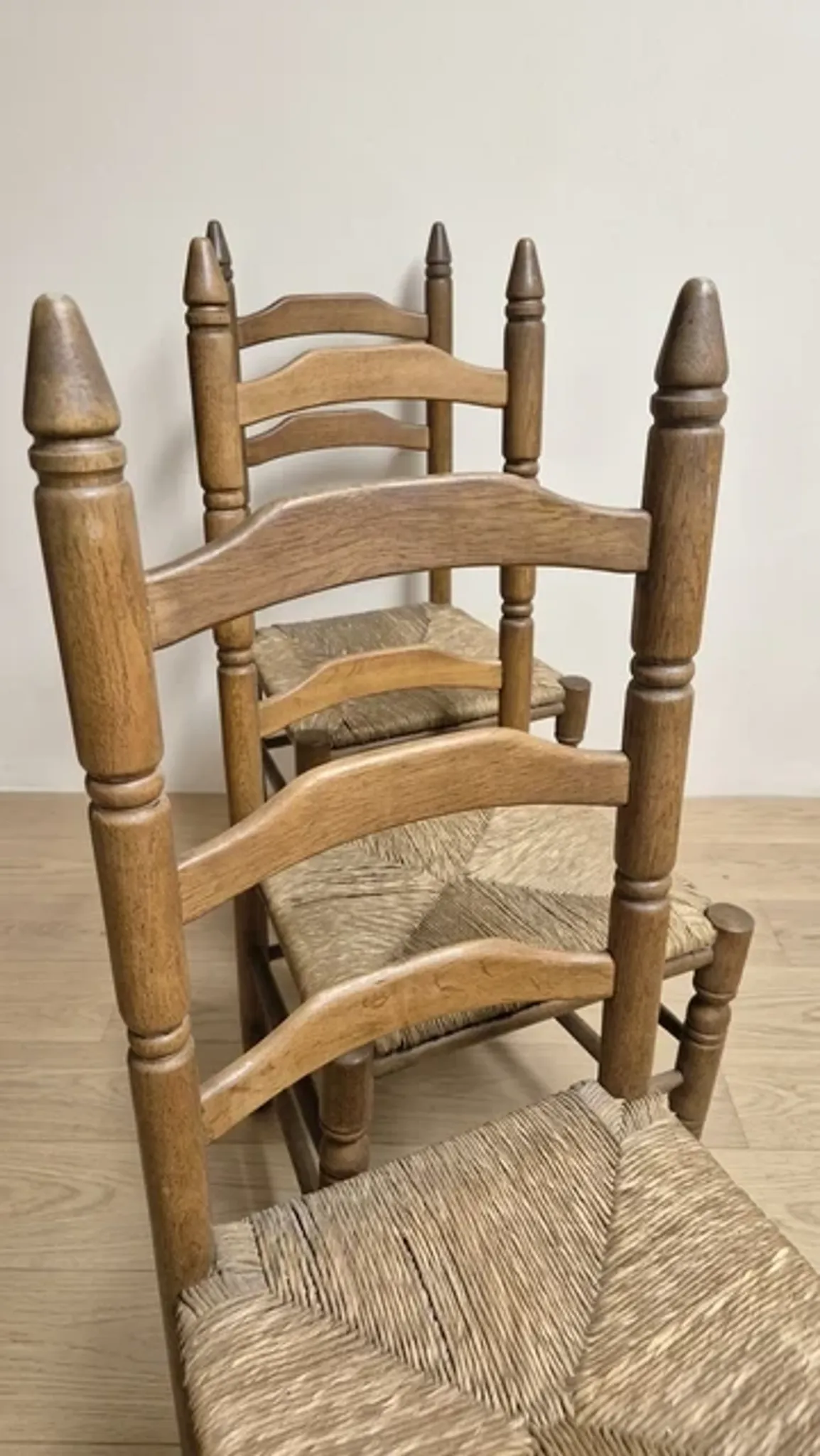 Set of 6 vintage wooden ladder-back dining chairs with woven seats, 20th century, 105 × 38 cm