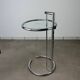 Chrome and glass design side table, adjustable.
