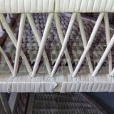 Rattan corner shelf