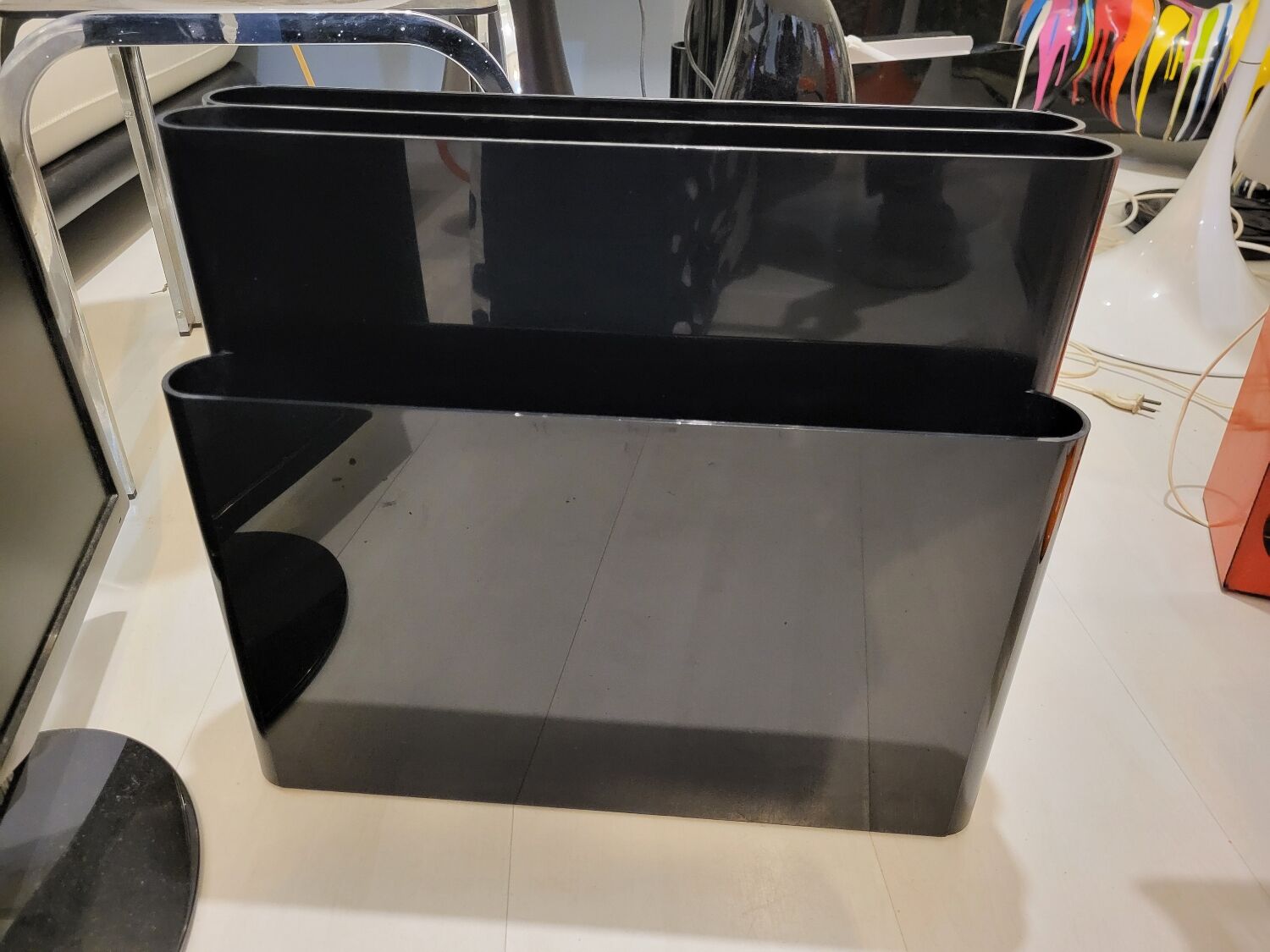 Kartell black magazine rack
