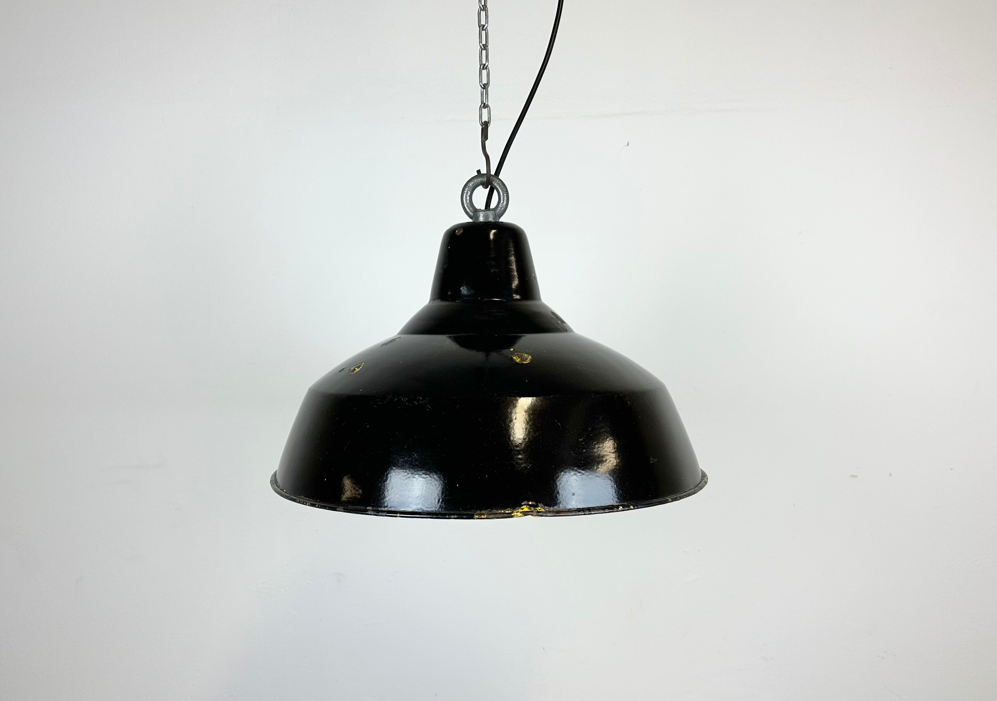 Industrial black enamel factory lamp with iron top, 1960s