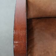 Art Deco design armchair in light cognac cowhide leather.
