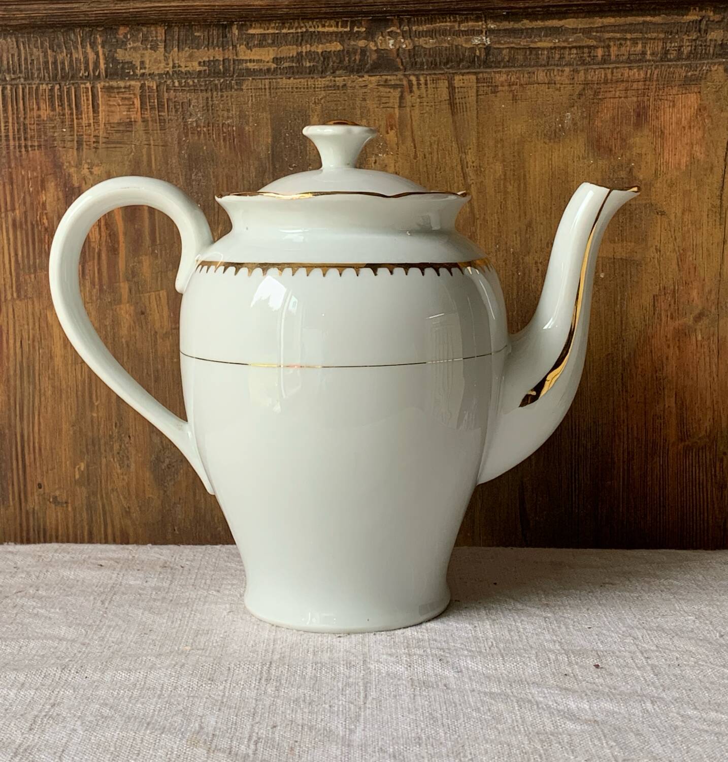 Antique porcelain jug with Limoges enamel