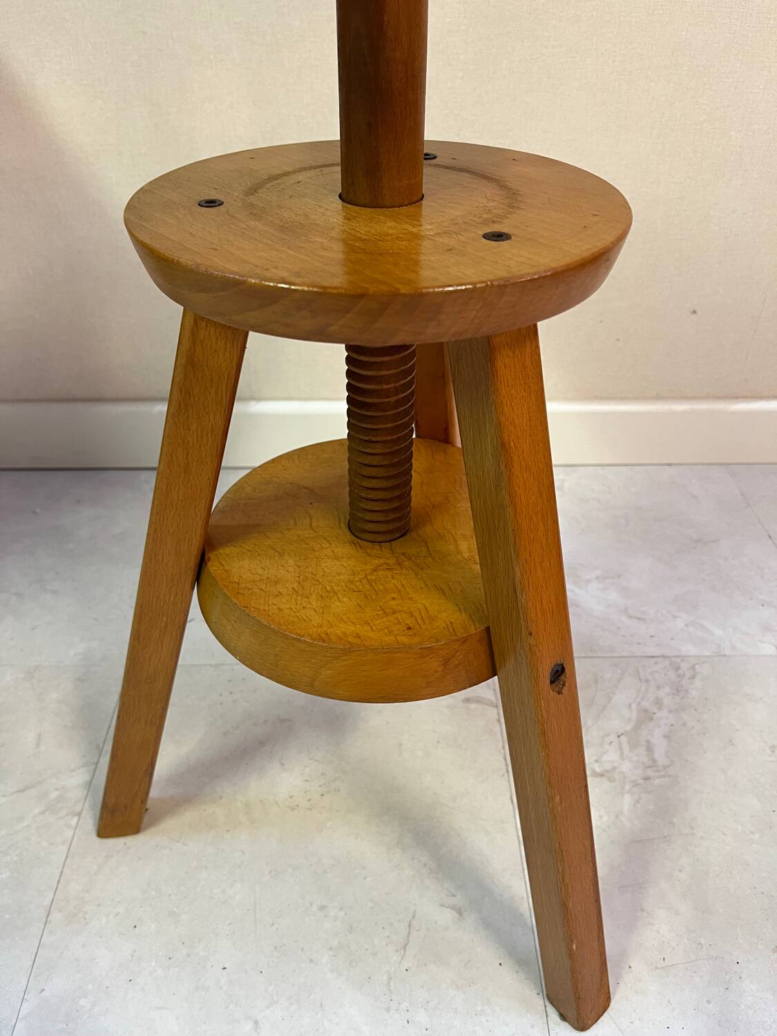 Adjustable and swivel wooden stool