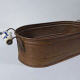 Copper planter with porcelain handles