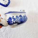 Small porcelain teapot or milk jug with the famous blue willow or weeping pattern