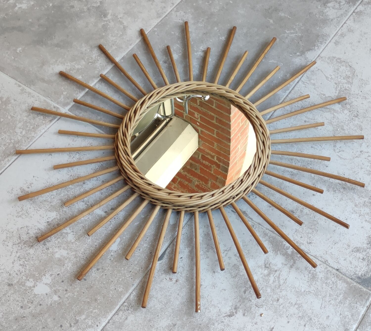 Vintage rattan sun mirror