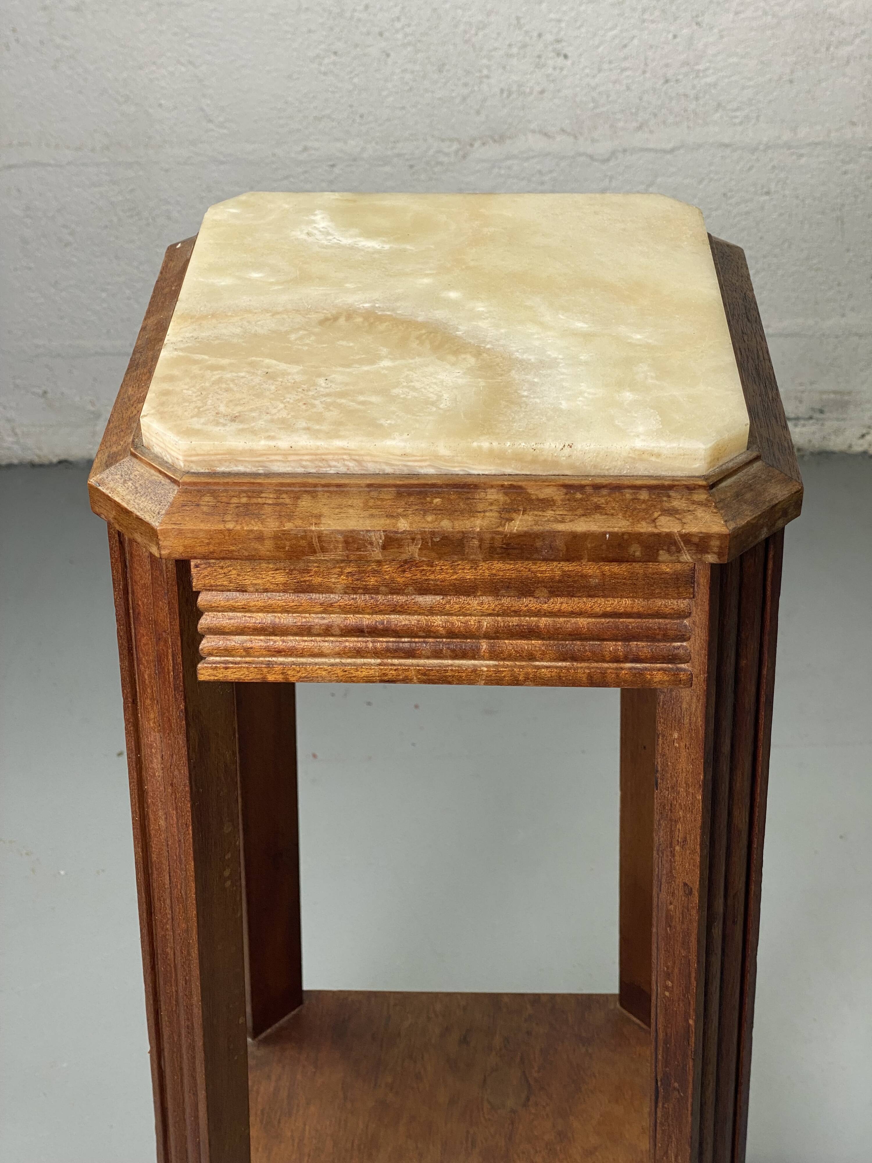 Wooden stool with marble top