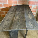 Antique writing desk, blackened wooden filing cabinet.