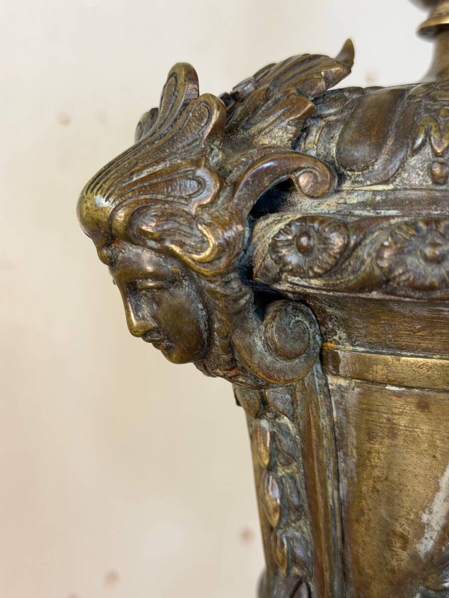 Pair of Louis XIV style andirons in bronze after a design by André-Charles Boulle.