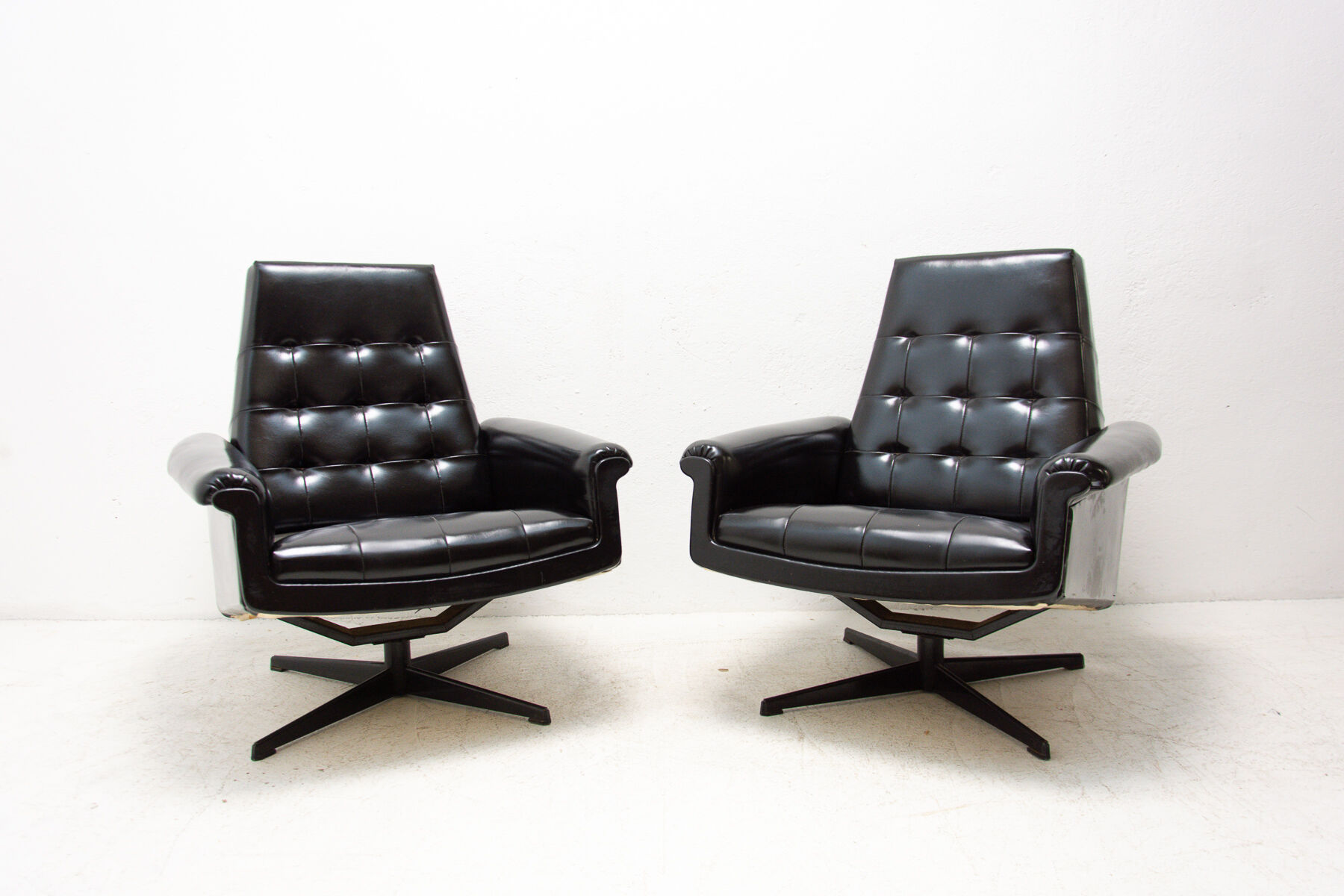 Pair of leather swivel armchairs from UP Zavody, 1970´s