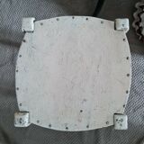 Vintage wooden stool with white peeling paint