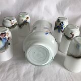 Pitcher orange service and 6 bubbled and opalescent puffed milky glasses