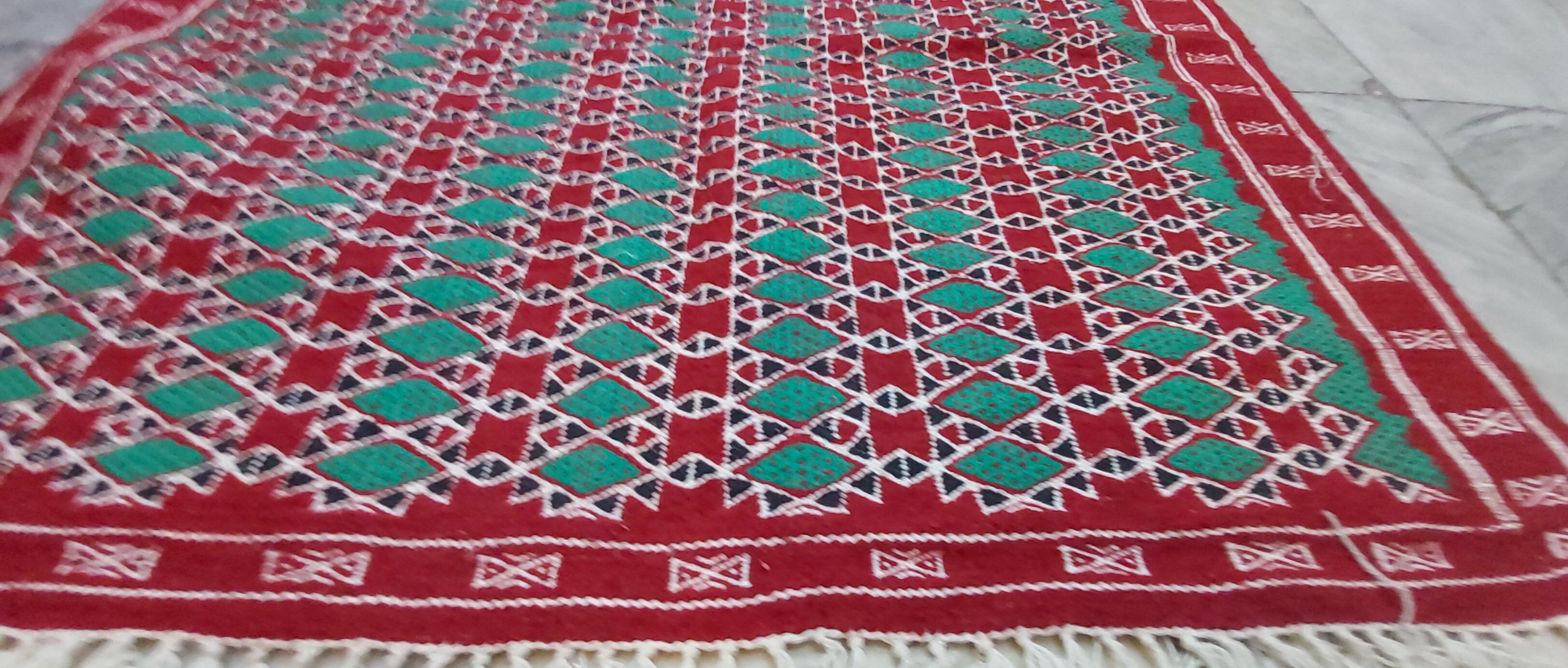 Traditional red and green handmade carpet in pure wool  115x210cm