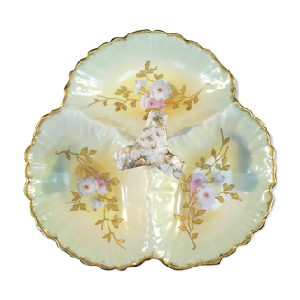 Limoges porcelain beggar servant with floral decoration