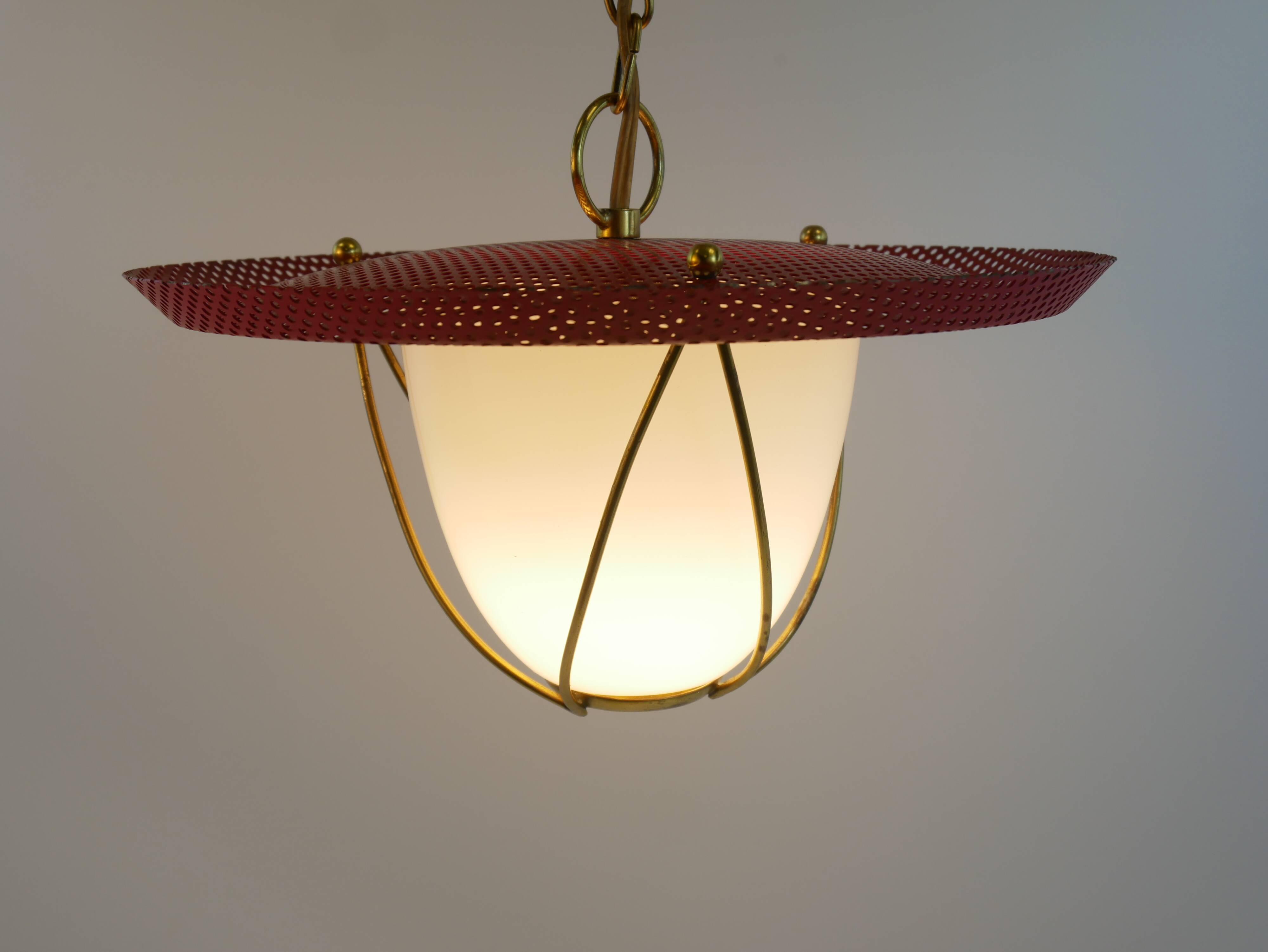 Suspension in perforated red lacquered metal, brass and opaline in the style of Mathieu Matégot