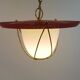 Suspension in perforated red lacquered metal, brass and opaline in the style of Mathieu Matégot