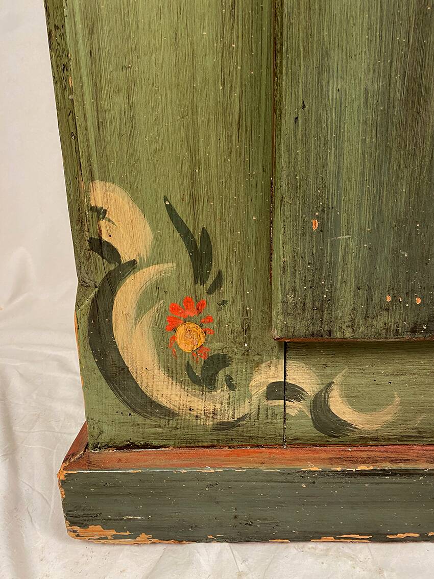 Alsatian bonnet maker in painted softwood with floral decorations