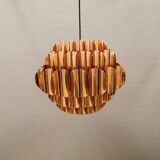 Copper colored hanging lamp. designed by thorsten orrling sweden