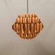 Copper colored hanging lamp. designed by thorsten orrling sweden