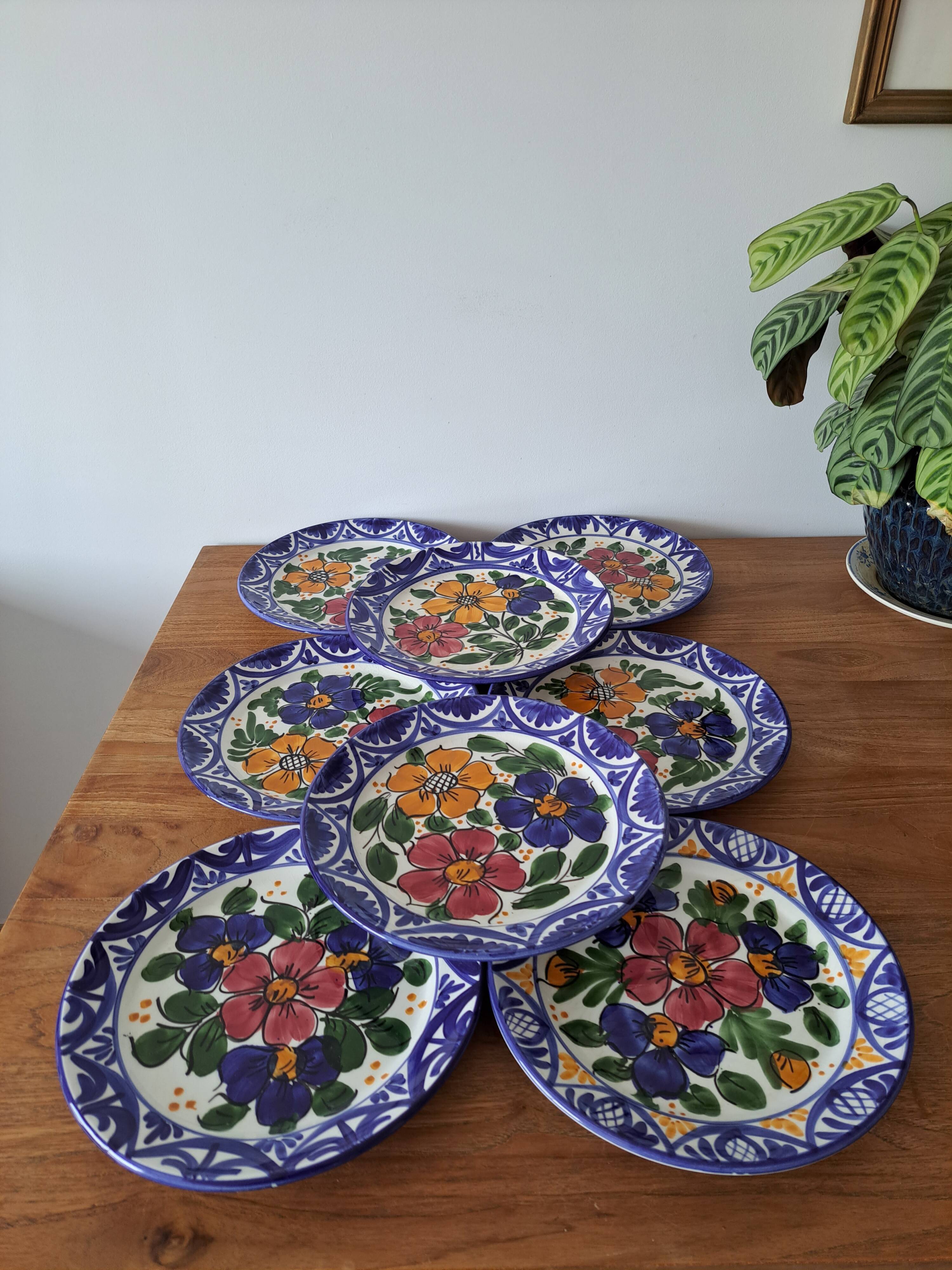 8 hand-painted plates