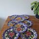 8 hand-painted plates