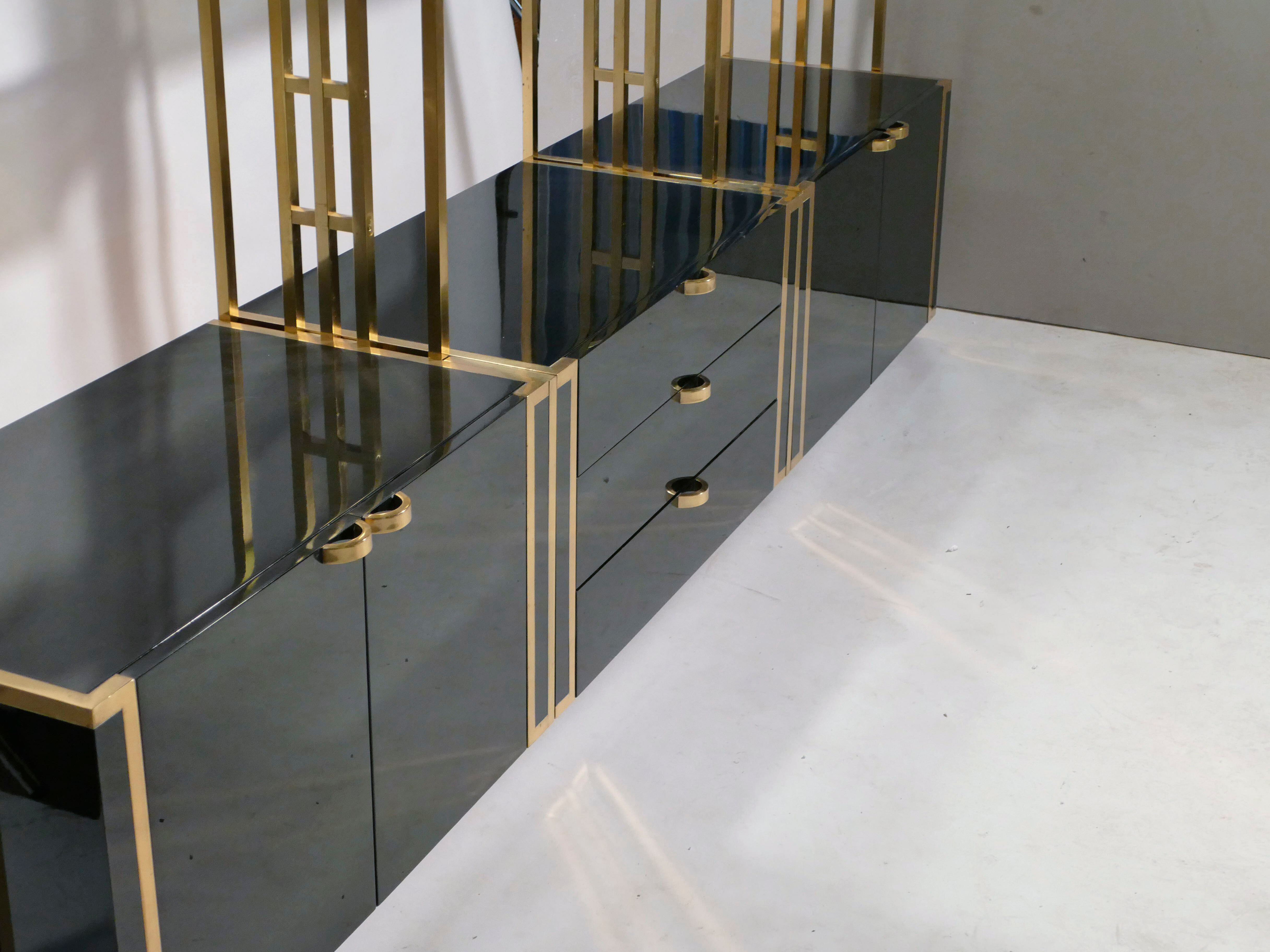 Brass laced library shelf by Kim Moltzer 1970