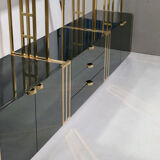 Brass laced library shelf by Kim Moltzer 1970