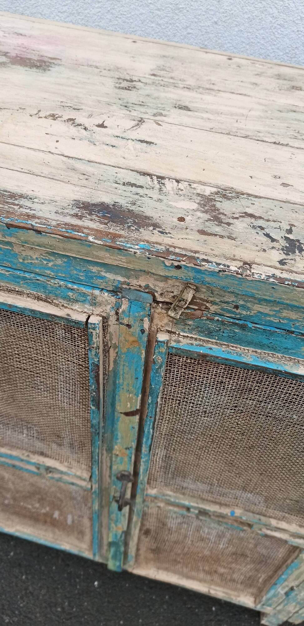 Small pantry buffet in old wood with mesh doors