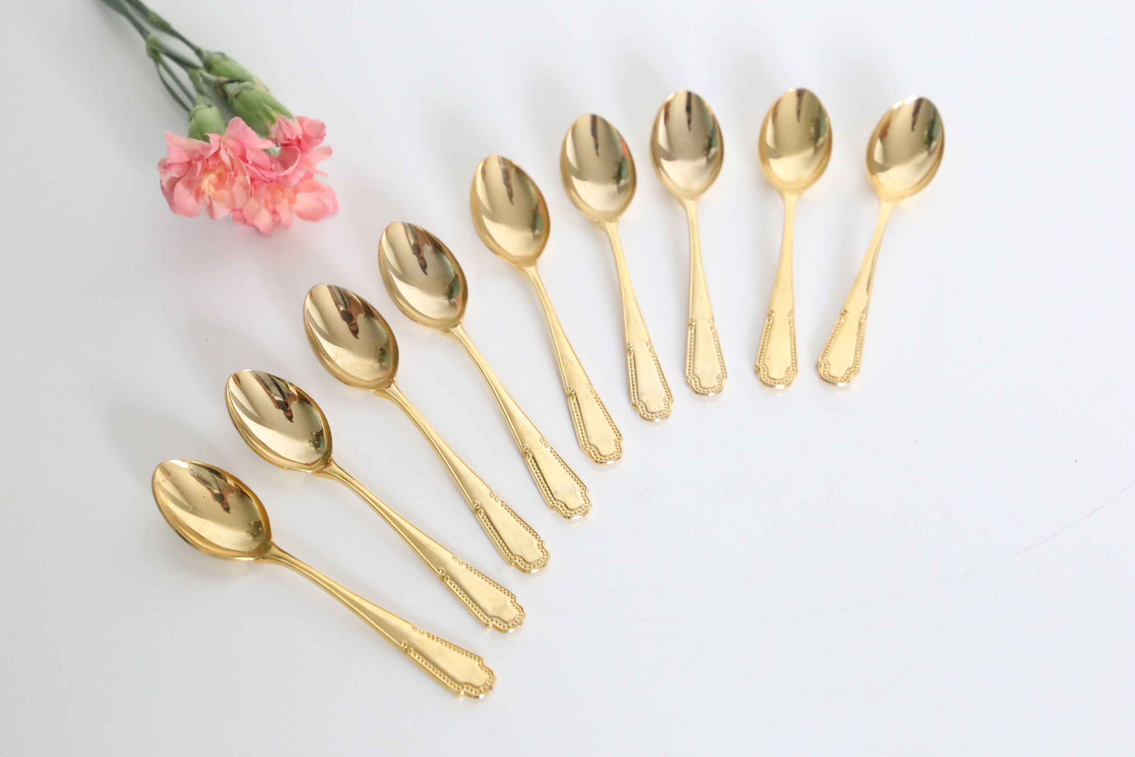 Service of 9 small golden spoons, vintage