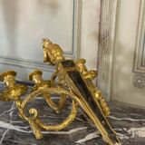 Pair of Louis XVI style wall sconces in gilded bronze, circa 1880.