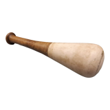 Imposing ancient ceramic pestle and wood