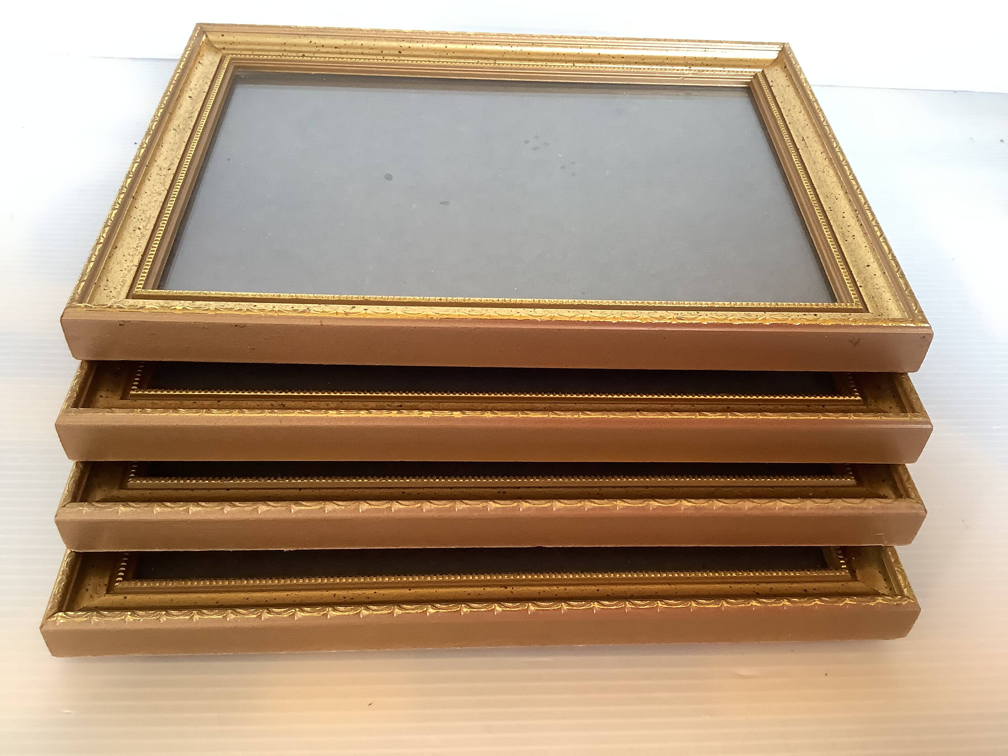Four gilded wood frames to place or hang