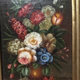 Oil on panel in the center of a frame
