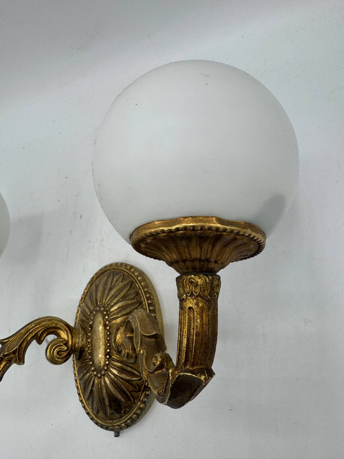 Double gold wall light