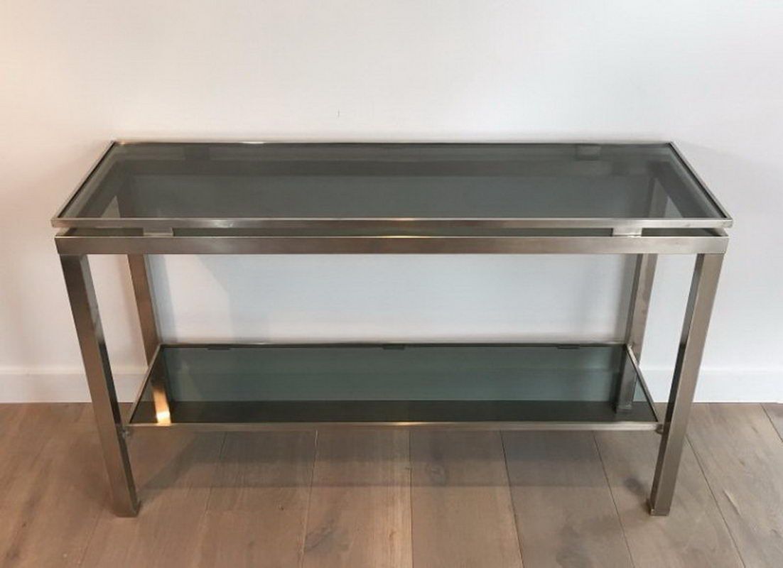 Beautiful console table in brushed metal with bluish glass shelves