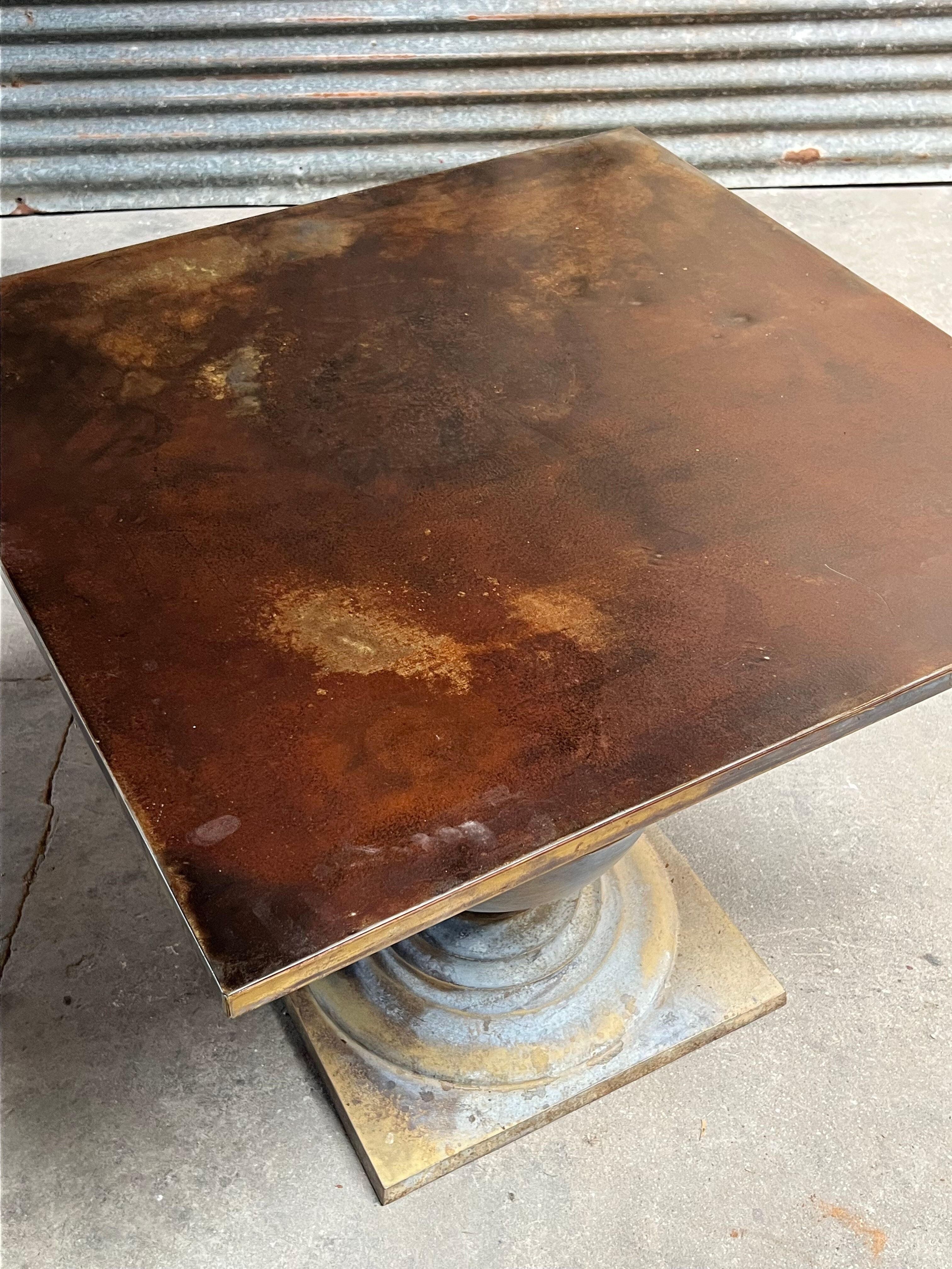 Patinated steel and zinc table