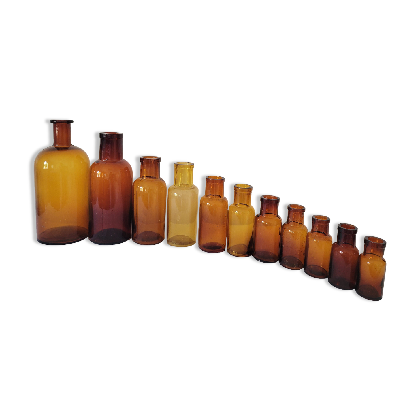 11 bottles of amber glass apothecary